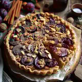 Tarte aux quetsches et crème d'amandes-noisettes parfumée cannelle