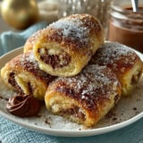 Rolls au Nutella on a plate.